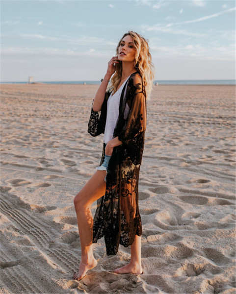 Női csipke pareo fehér és fekete színben