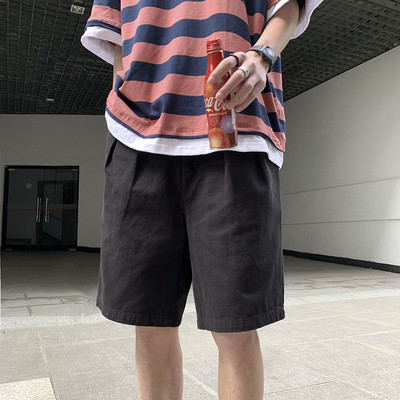 Fekete, zöld és bézs színű férfi rövidnadrág zsebekkel