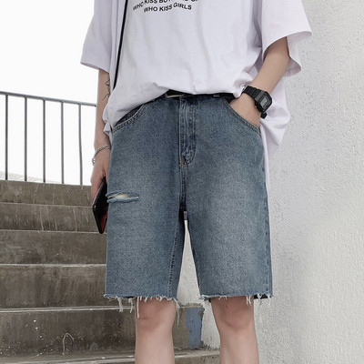 Актуални къси дънкови панталони със скъсани мотиви в син цвят