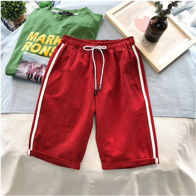 Modern férfi rövidnadrág oldalsó szegéllyel, különböző színekben