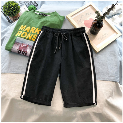 Modern férfi rövidnadrág oldalsó szegéllyel, különböző színekben