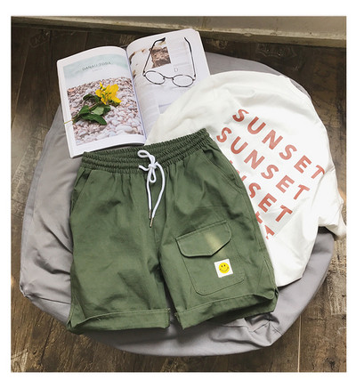 Alkalmi férfi rövidnadrág zsebbel és rátéttel több színben