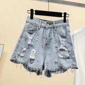 Femei moderne subțiri cu talie înaltă și pietre în albastru