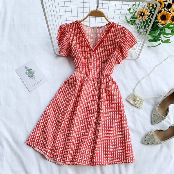 Női ruha hátul cipzárral és V-nyakkal