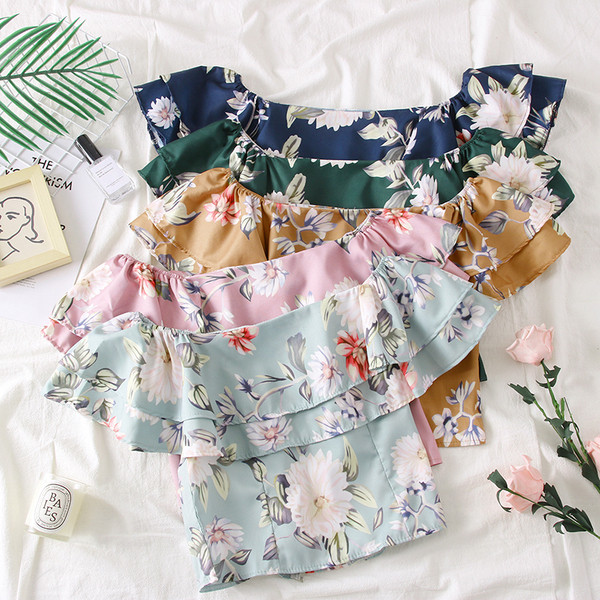 Κομψή γυναικεία μπλούζα σε διάφορα χρώματα με floral μοτίβα