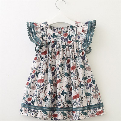 Lezser gyerekruha két színben virágos motívumokkal