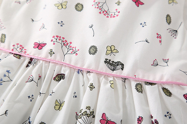 Modern szabású fehér gyerekruha lányoknak