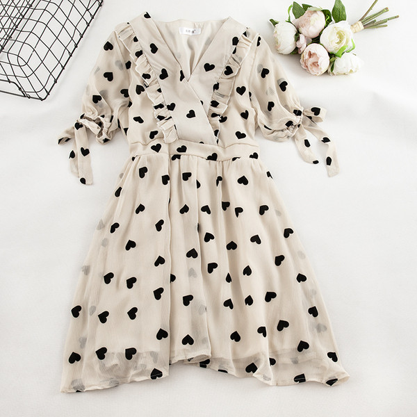 Γυναικέιο σύγχρονο φόρεμα με ντεκολτέ σε σχήμα V σε μπεζ και ροζ χρώμα