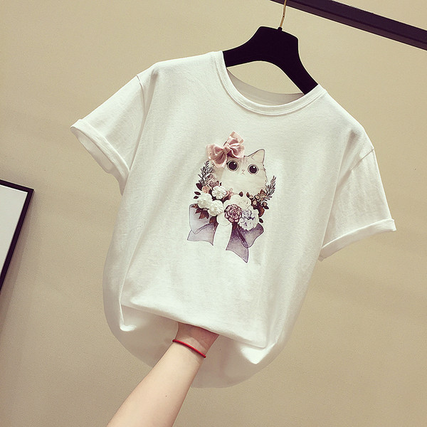 Καθημερινή γυναικεία μπλούζα με εφαρμογές και κορδέλα σε δύο χρώματα