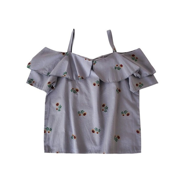 Modern női felső, fehér és kék hímzéssel