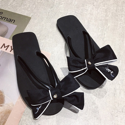 Κομψές γυναικείες παντόφλες με κορδέλα σε δύο χρώματα