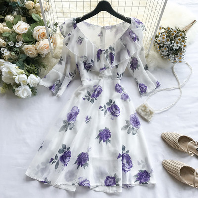 Καλοκαιρινό γυναικείο  φόρεμα σε λευκό με floral μοτίβα