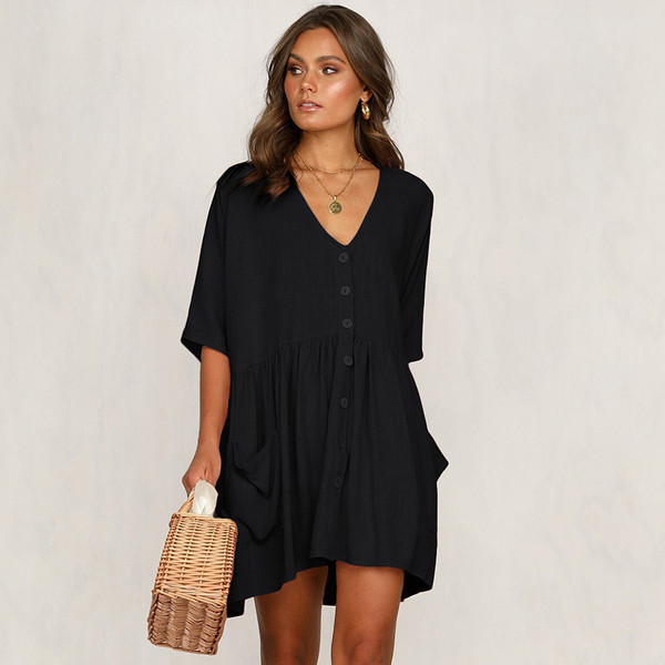 Alkalmi női ruha széles modell gombokkal és zsebekkel fehér és fekete színben