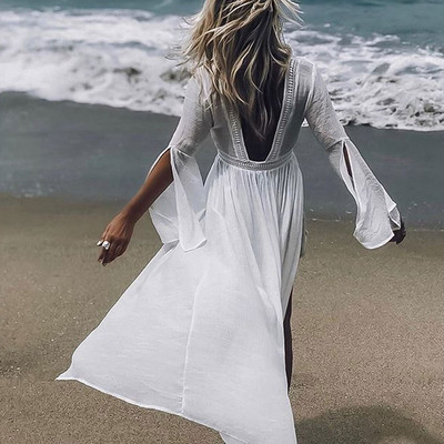 Pareo de damă actual în alb cu spatele gol și mâneci lungi