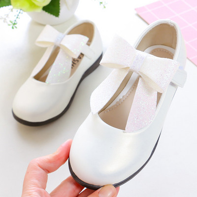 Modern gyerekcipő három színben, szalaggal