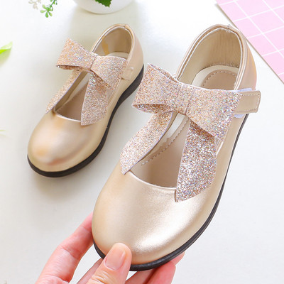 Modern gyerekcipő három színben, szalaggal