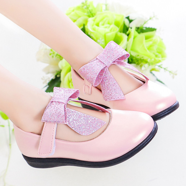 Modern gyerekcipő három színben, szalaggal