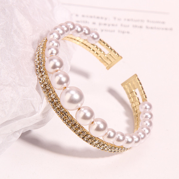 Női karkötő két színben gyöngyökkel és kövekkel