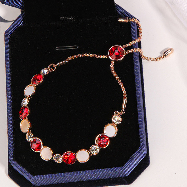 Stílusos női karkötő három színben kövekkel