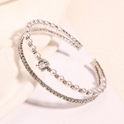 Modern karkötő két színben kövekkel és gyöngyökkel