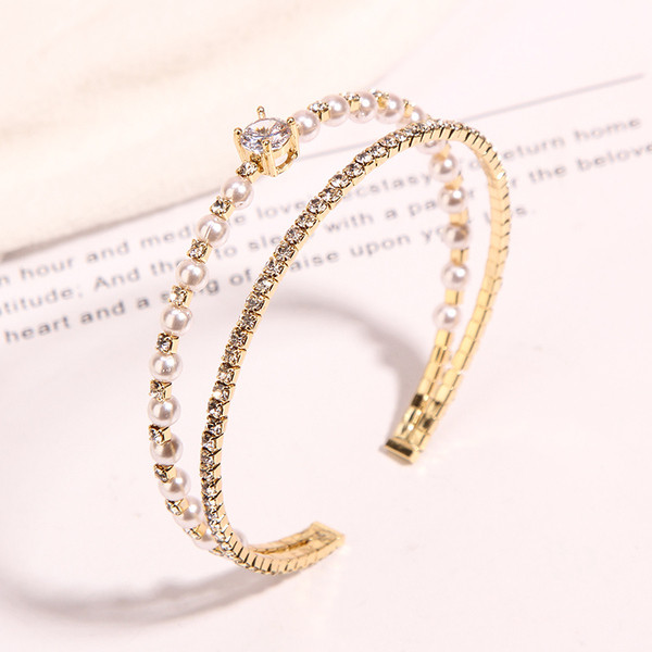 Modern karkötő két színben kövekkel és gyöngyökkel