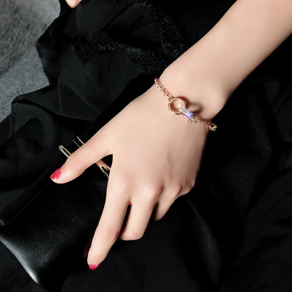 Bratara de dama de culoare auriu si argintiu cu pietre