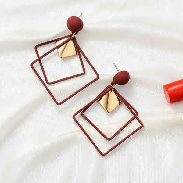 Cercei de dama in trei culori si decor metalic