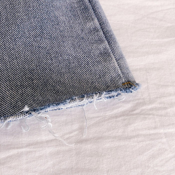 Fusta de damă actuală din denim cu aplicație de buzunar cu talie înaltă