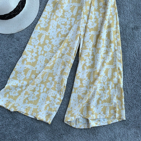 Актуален дамски дълъг гащеризон с флорални мотиви в три цвята