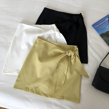 Stílusos női szoknya magas derékkal, fehér, fekete és zöld színben