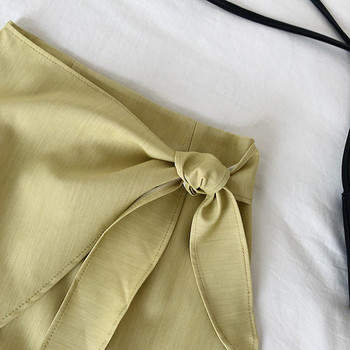 Stílusos női szoknya magas derékkal, fehér, fekete és zöld színben