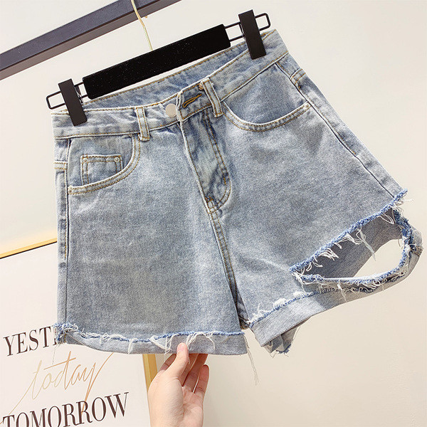 Blugi de dama moderni cu motive rupte