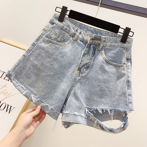 Blugi de dama moderni cu motive rupte