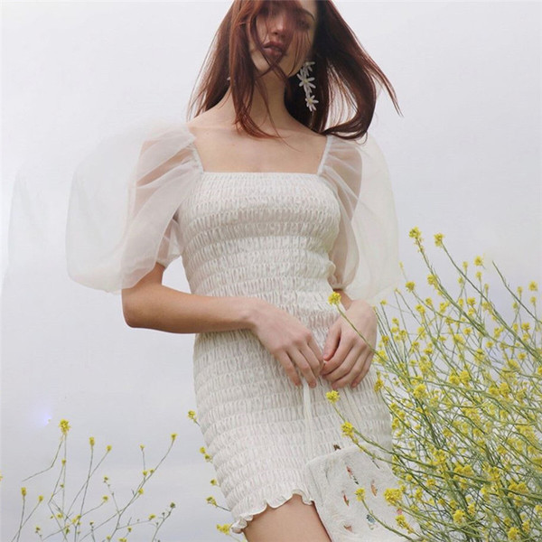 Rochie de dama actuala model Slim cu maneci transparente in culoarea alba