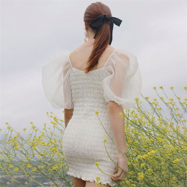 Rochie de dama actuala model Slim cu maneci transparente in culoarea alba