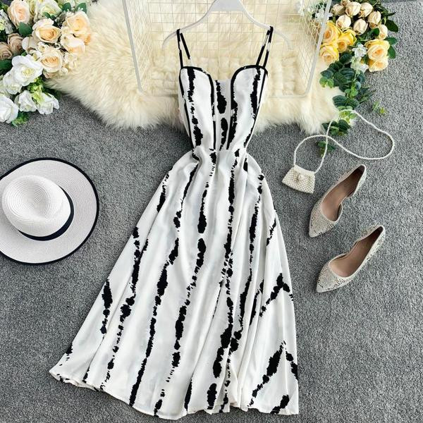 Rochie lungă de damă cu bretele subțiri în alb-negru