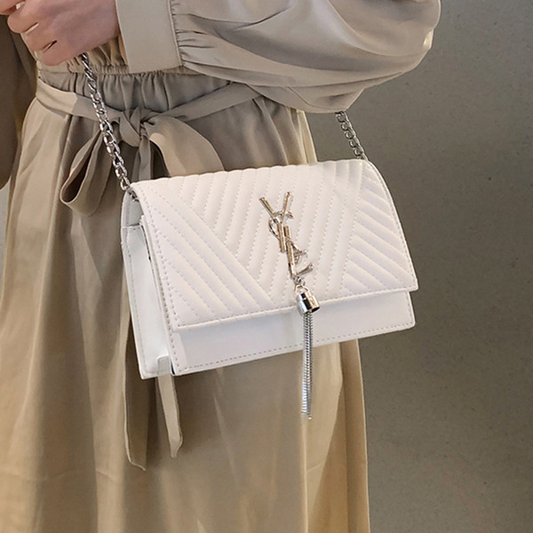 Geanta de dama eleganta cu maner lung si decor metalic