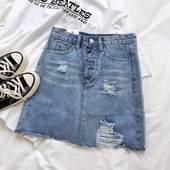 Női farmerszoknya magas derékkal, szakadt motívumokkal