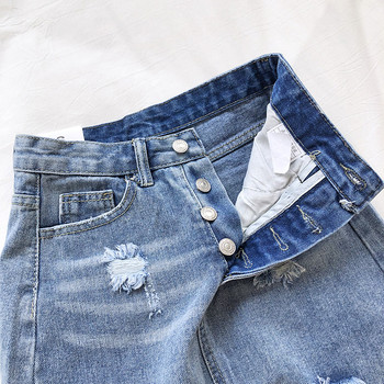 Női farmerszoknya magas derékkal, szakadt motívumokkal