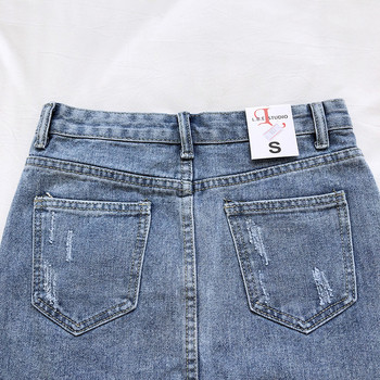 Női farmerszoknya magas derékkal, szakadt motívumokkal