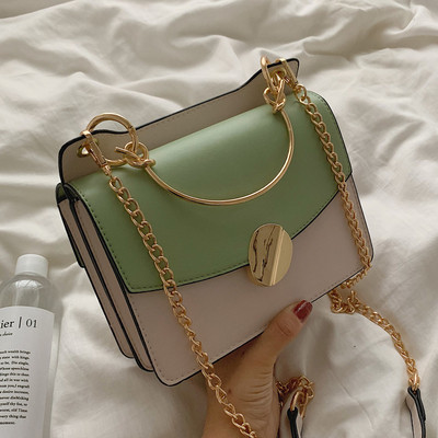 Geanta de dama eleganta din piele ecologica in patru culori cu decor metalic