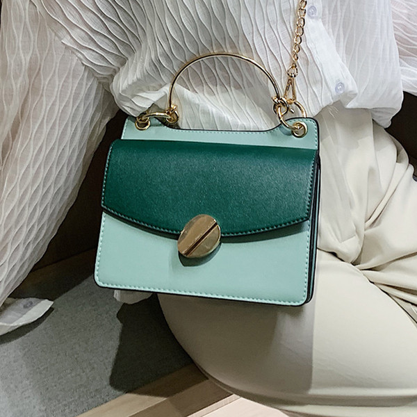 Geanta de dama eleganta din piele ecologica in patru culori cu decor metalic