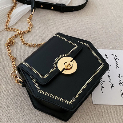 Geanta de dama din piele cu maner metalic