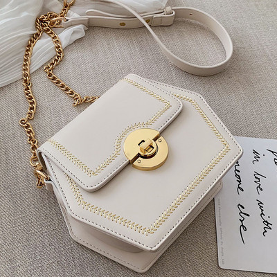 Geanta de dama din piele cu maner metalic