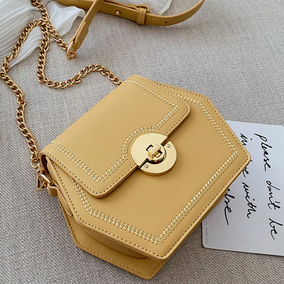 Geanta de dama din piele cu maner metalic