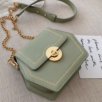 Geanta de dama din piele cu maner metalic