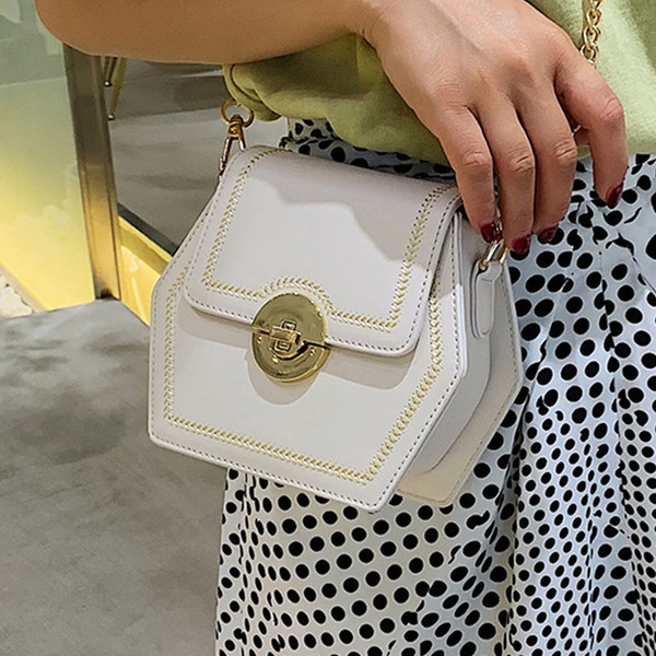 Geanta de dama din piele cu maner metalic