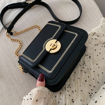 Geanta de dama din piele ecologica cu inchidere metalica