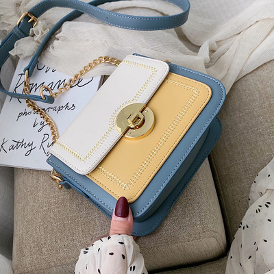 Geanta de dama din piele ecologica cu inchidere metalica