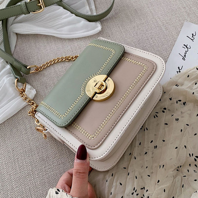 Geanta de dama din piele ecologica cu inchidere metalica